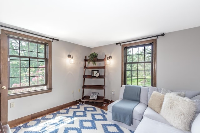 19 Cambridge Rd, Hampstead, NH 03841 - living area with plenty of natural light, wood finished floors, and baseboards