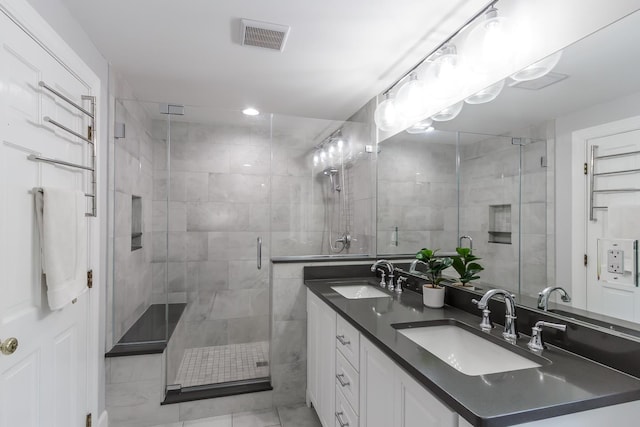 19 Cambridge Rd, Hampstead, NH 03841 - bathroom featuring double vanity and a stall shower