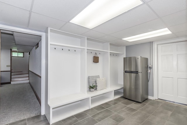 19 Cambridge Rd, Hampstead, NH 03841 - mudroom featuring a drop ceiling, tile patterned floors, and baseboards