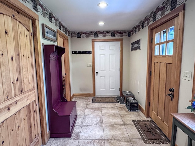 93 Rowell Hill Rd, New London, NH 03257 - mudroom with baseboards and light tile patterned floors