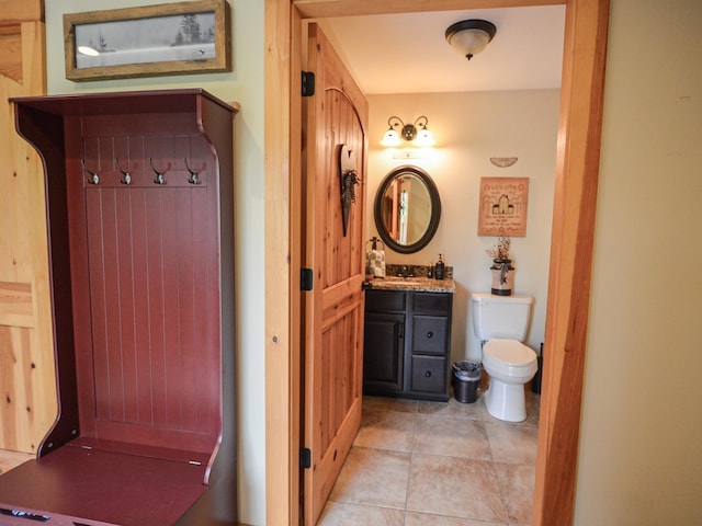 93 Rowell Hill Rd, New London, NH 03257 - bathroom featuring toilet, vanity, and tile patterned floors