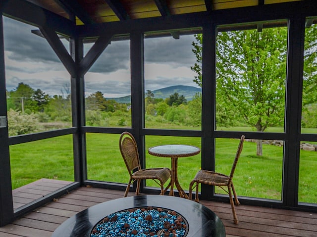 93 Rowell Hill Rd, New London, NH 03257 - sunroom featuring an outdoor fire pit and a mountain view