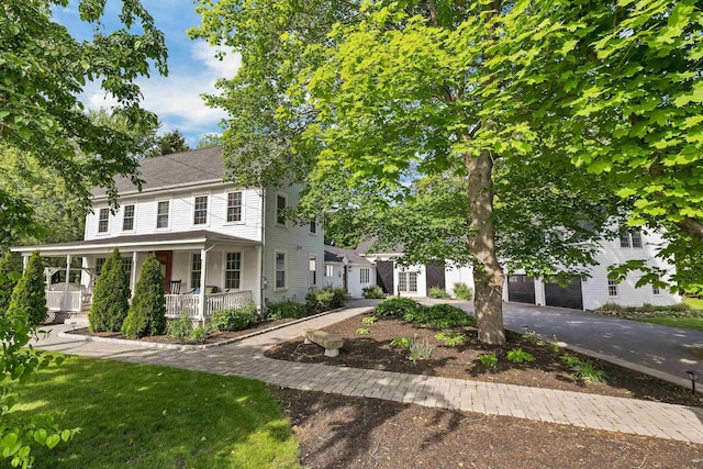92 Mace Rd, Hampton, NH 03842 - view of front facade with a porch and driveway