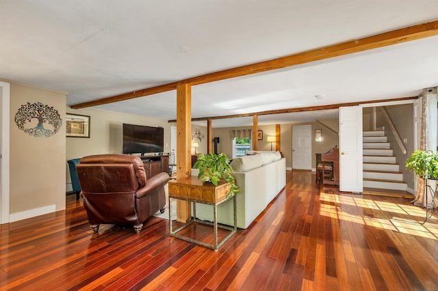 92 Mace Rd, Hampton, NH 03842 - living room with wood finished floors, stairway, and beamed ceiling