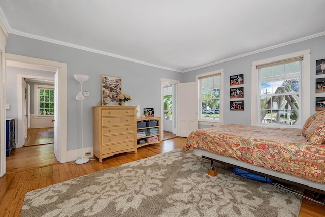 92 Mace Rd, Hampton, NH 03842 - bedroom with ornamental molding, hardwood / wood-style floors, and baseboards