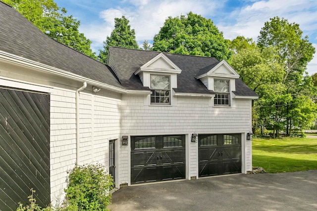 92 Mace Rd, Hampton, NH 03842 - garage with asphalt driveway