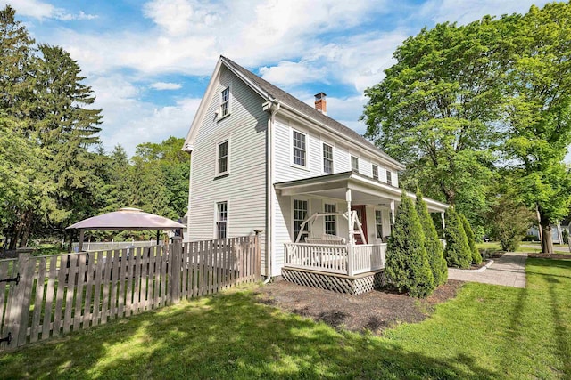 92 Mace Rd, Hampton, NH 03842 - view of front facade featuring a gazebo, a chimney, and a wooden deck