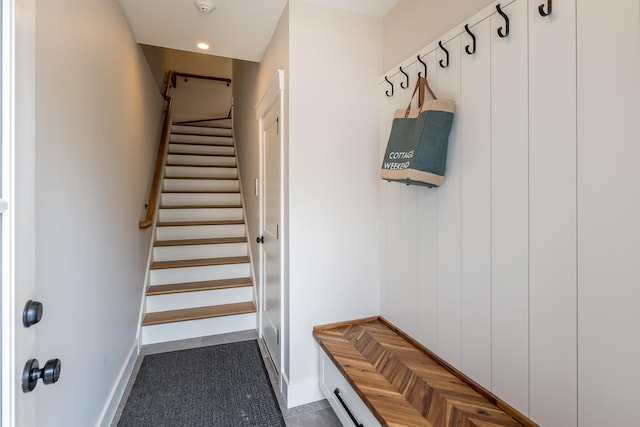 60 White Oaks Rd Unit 26, Laconia, NH 03246 - mudroom featuring baseboards and dark tile patterned floors