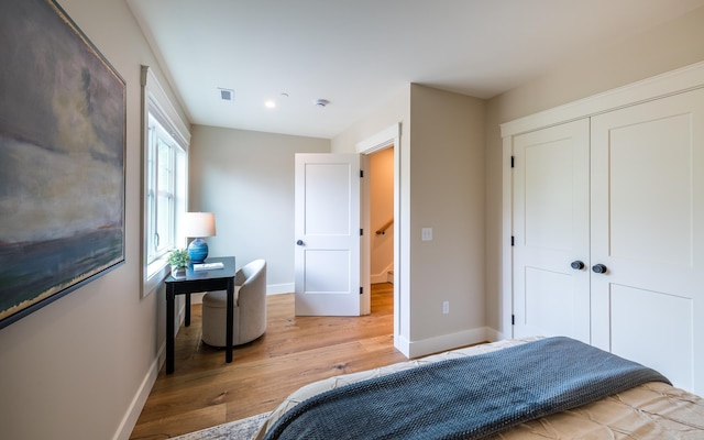 60 White Oaks Rd Unit 26, Laconia, NH 03246 - bedroom featuring baseboards, light wood-style floors, a closet, and recessed lighting