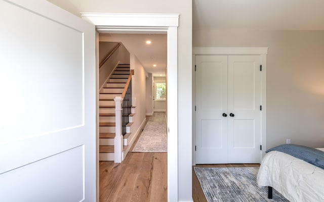60 White Oaks Rd Unit 26, Laconia, NH 03246 - bedroom featuring light wood-type flooring, a closet, and recessed lighting