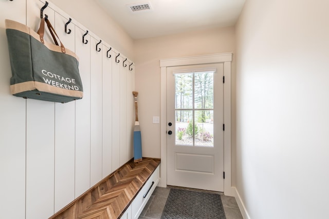 60 White Oaks Rd Unit 26, Laconia, NH 03246 - mudroom featuring dark tile patterned floors