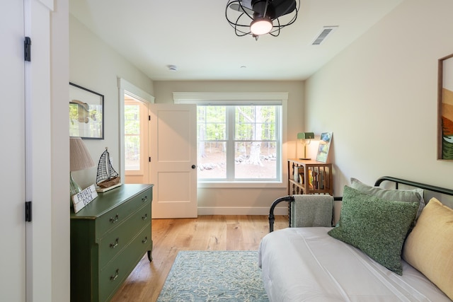 60 White Oaks Rd Unit 26, Laconia, NH 03246 - bedroom featuring light wood-type flooring and baseboards