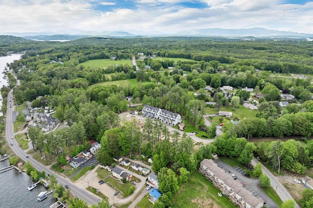 60 White Oaks Rd Unit 26, Laconia, NH 03246 - drone / aerial view of a water and mountain view and a heavily wooded area