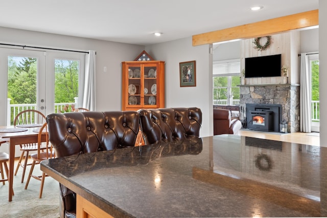 345 Williams Rd, Littleton, NH 03561 - living room featuring healthy amount of natural light, french doors, recessed lighting, and a fireplace