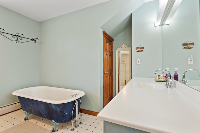 345 Williams Rd, Littleton, NH 03561 - full bath with a soaking tub, vanity, baseboards, and tile patterned floors