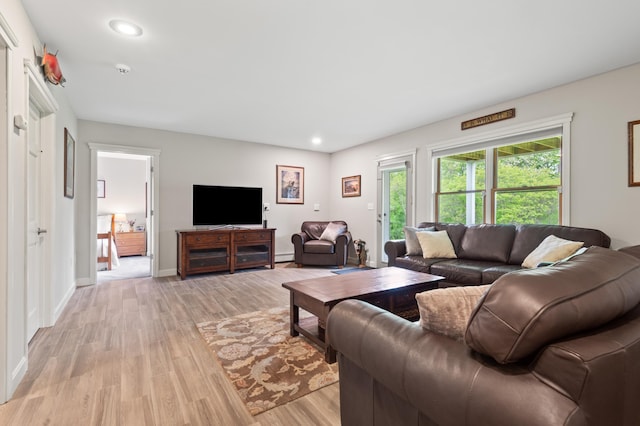 345 Williams Rd, Littleton, NH 03561 - living room featuring light wood-style floors, recessed lighting, a baseboard heating unit, and baseboards