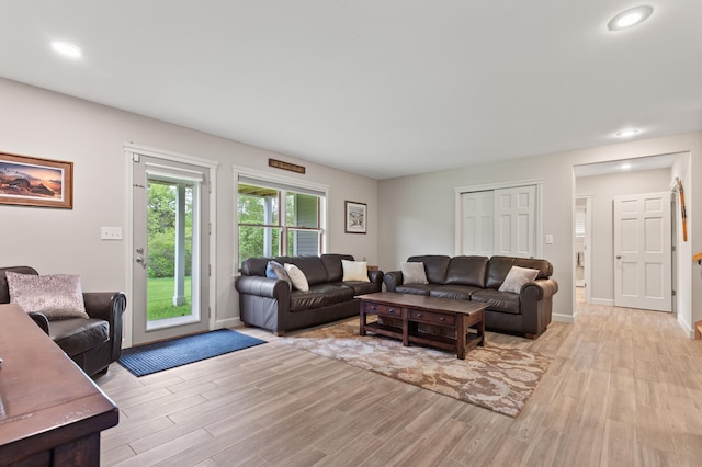 345 Williams Rd, Littleton, NH 03561 - living area with light wood-style floors, recessed lighting, and baseboards