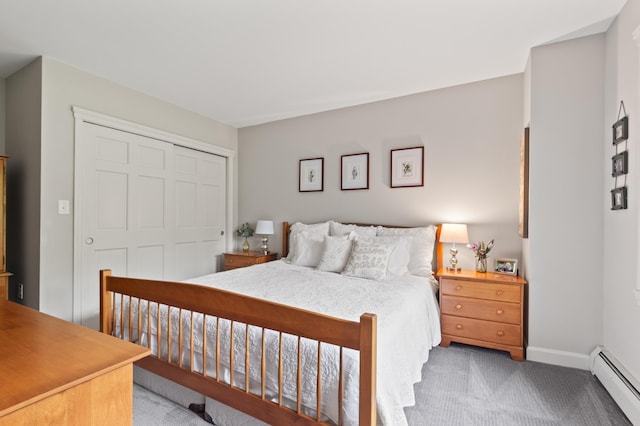 345 Williams Rd, Littleton, NH 03561 - bedroom with a baseboard heating unit, light colored carpet, a closet, and baseboards