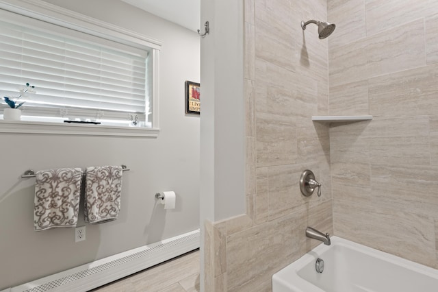 345 Williams Rd, Littleton, NH 03561 - bathroom featuring shower / tub combination and a baseboard radiator