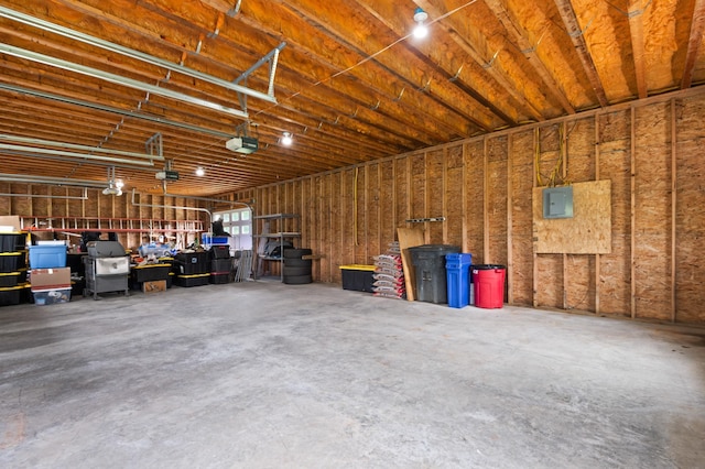 345 Williams Rd, Littleton, NH 03561 - garage with electric panel and a garage door opener