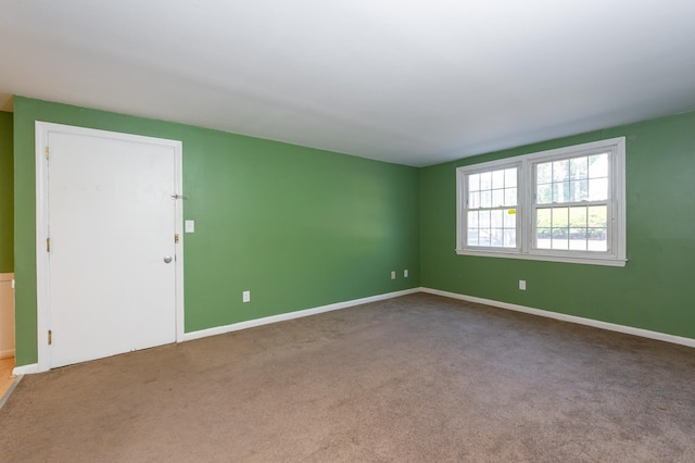 101 E Broadway Rd Unit 1, Derry, NH 03038 - carpeted empty room with baseboards