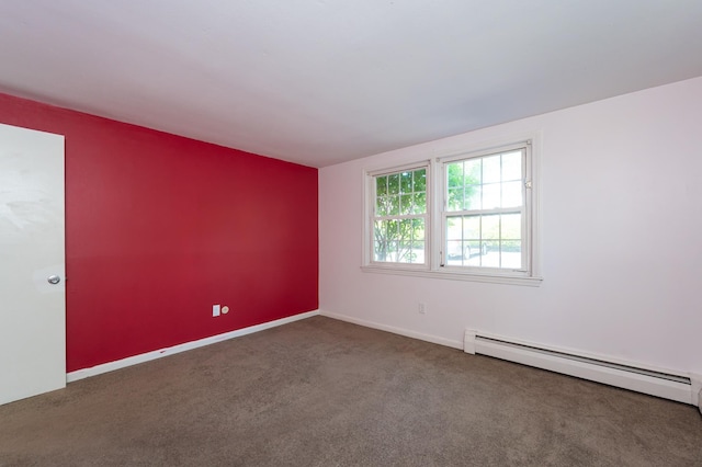 101 E Broadway Rd Unit 1, Derry, NH 03038 - carpeted spare room with a baseboard radiator and baseboards