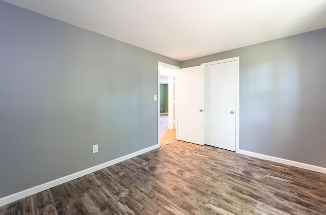 101 E Broadway Rd Unit 1, Derry, NH 03038 - spare room featuring wood finished floors and baseboards