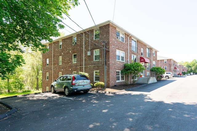 101 E Broadway Rd Unit 1, Derry, NH 03038 - view of building exterior with uncovered parking