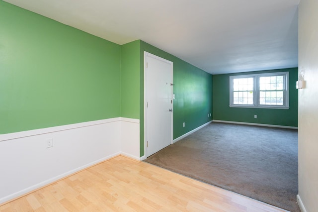 101 E Broadway Rd Unit 1, Derry, NH 03038 - unfurnished room featuring wood finished floors and baseboards