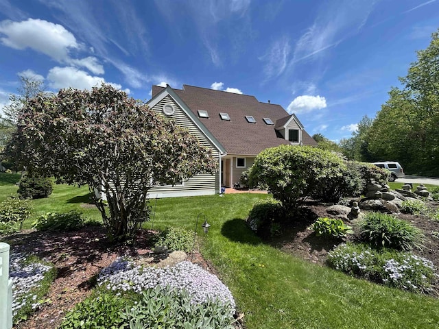 51 Cardinal Dr Unit B, Laconia, NH 03246 - view of home's exterior featuring a yard