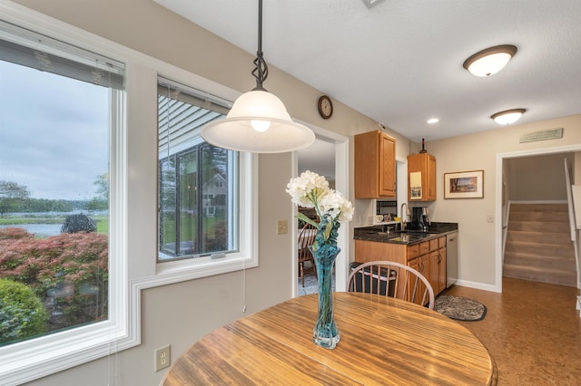 51 Cardinal Dr Unit B, Laconia, NH 03246 - dining room featuring stairway and baseboards