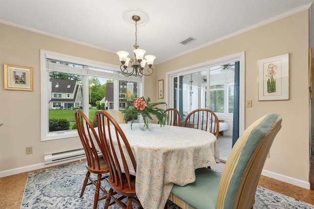 51 Cardinal Dr Unit B, Laconia, NH 03246 - dining room with crown molding, baseboards, a chandelier, and plenty of natural light