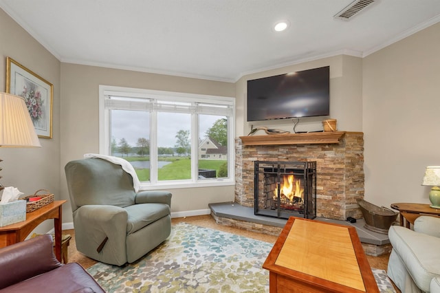 51 Cardinal Dr Unit B, Laconia, NH 03246 - living area featuring a stone fireplace, ornamental molding, baseboards, and recessed lighting