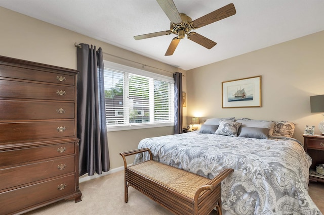 51 Cardinal Dr Unit B, Laconia, NH 03246 - bedroom with light colored carpet, a ceiling fan, and baseboards