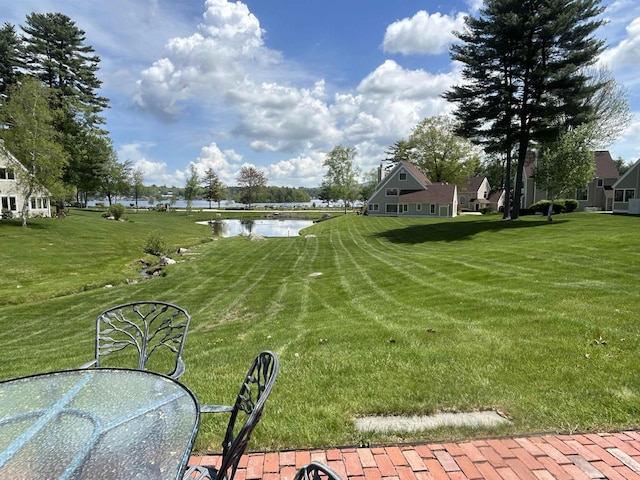 51 Cardinal Dr Unit B, Laconia, NH 03246 - view of grassy yard featuring a water view