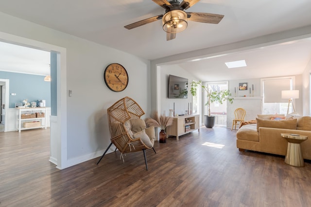 12 Harvard St, Exeter, NH 03862 - living area with dark wood-type flooring, ceiling fan, and baseboards