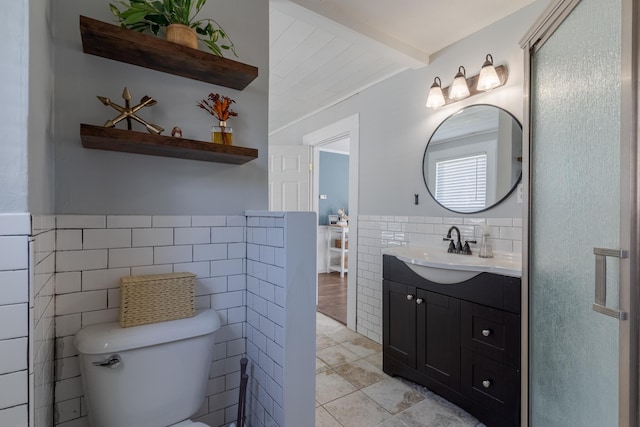 12 Harvard St, Exeter, NH 03862 - bathroom featuring tile walls, vanity, toilet, tile patterned floors, and beam ceiling
