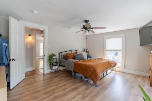 12 Harvard St, Exeter, NH 03862 - bedroom featuring light wood-type flooring, baseboards, and a ceiling fan