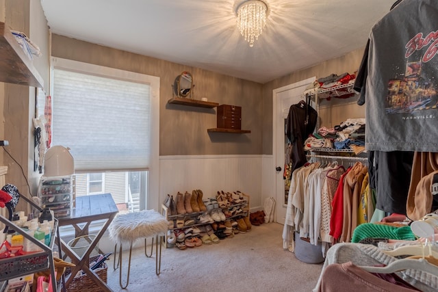 12 Harvard St, Exeter, NH 03862 - walk in closet with carpet floors and a chandelier