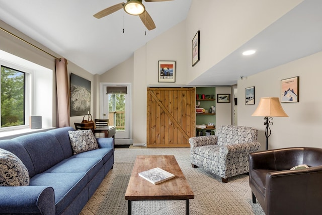 137 E Mountain Rd Unit 2E1, Killington, VT 05751 - living room with plenty of natural light, ceiling fan, light colored carpet, high vaulted ceiling, and baseboards