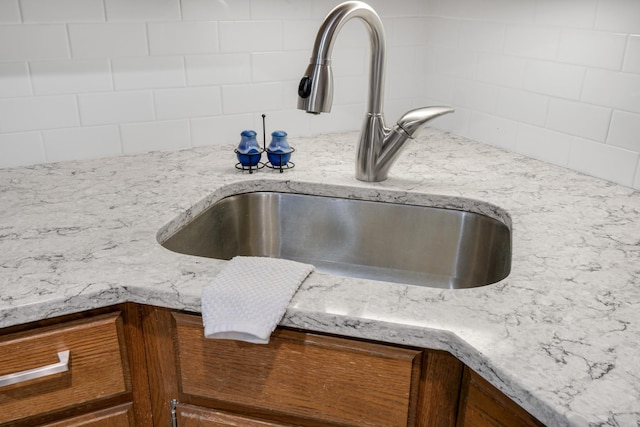 137 E Mountain Rd Unit 2E1, Killington, VT 05751 - kitchen view of a sink and light stone counters