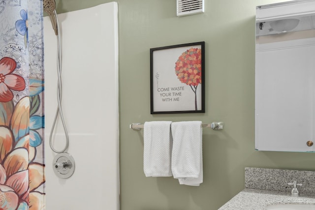 137 E Mountain Rd Unit 2E1, Killington, VT 05751 - full bathroom with a shower with shower curtain and vanity