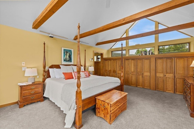 83 Dewey Farm Rd, Stowe, VT 05672 - bedroom featuring beam ceiling, light carpet, and high vaulted ceiling