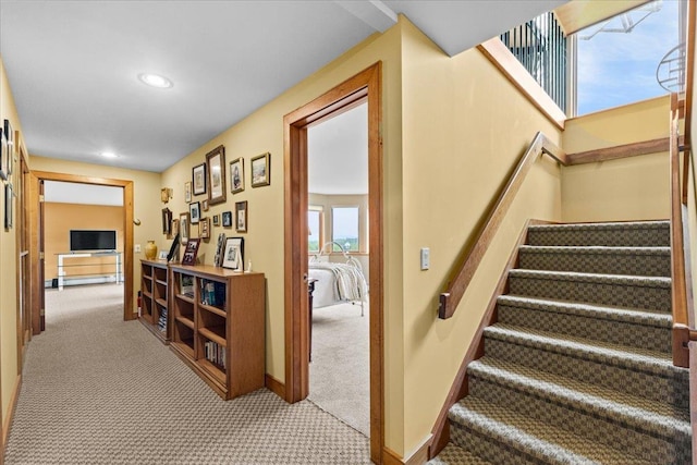 83 Dewey Farm Rd, Stowe, VT 05672 - stairway with carpet floors, recessed lighting, a baseboard heating unit, and baseboards
