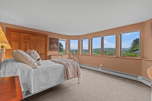 83 Dewey Farm Rd, Stowe, VT 05672 - carpeted bedroom with a baseboard radiator and baseboards