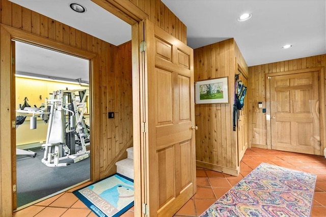 83 Dewey Farm Rd, Stowe, VT 05672 - entrance foyer with wood walls, light tile patterned floors, recessed lighting, and stairs