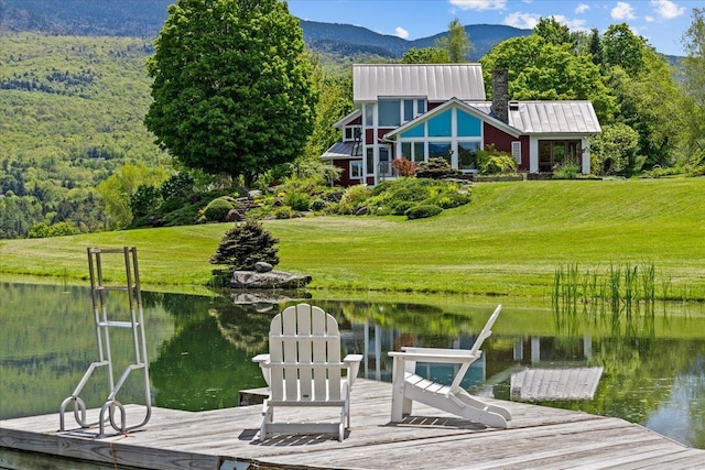 83 Dewey Farm Rd, Stowe, VT 05672 - dock with a water and mountain view and a lawn