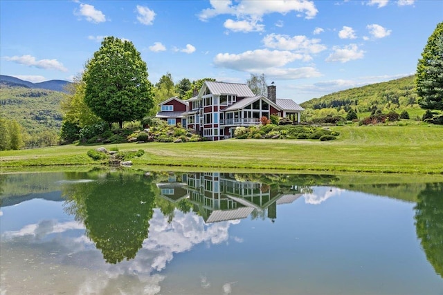 83 Dewey Farm Rd, Stowe, VT 05672 - water view featuring a heavily wooded area, a dock, and mountains