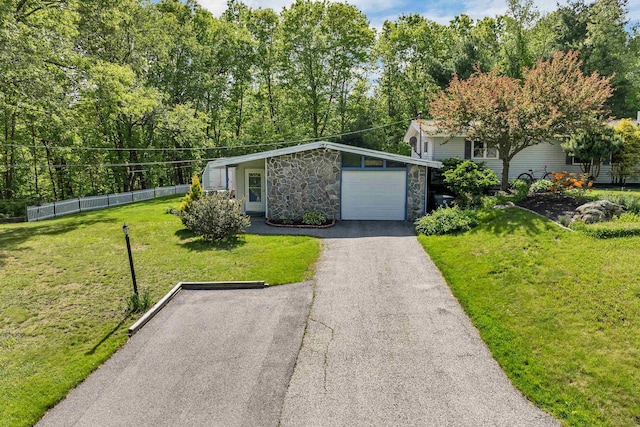 4 Johns Dr Unit A, Hooksett, NH 03106 - view of front of property with an attached garage, stone siding, and asphalt driveway