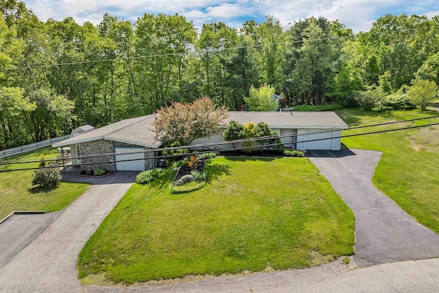 4 Johns Dr Unit A, Hooksett, NH 03106 - view of front of home with asphalt driveway and a view of trees